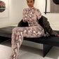 KK Snake Print Foot Jumpsuits